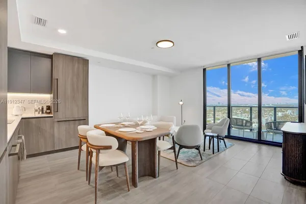 a view of a livingroom with furniture and window