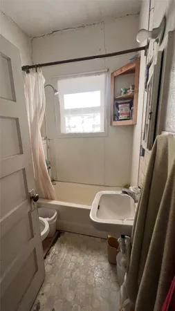 a bathroom with a sink and a toilet