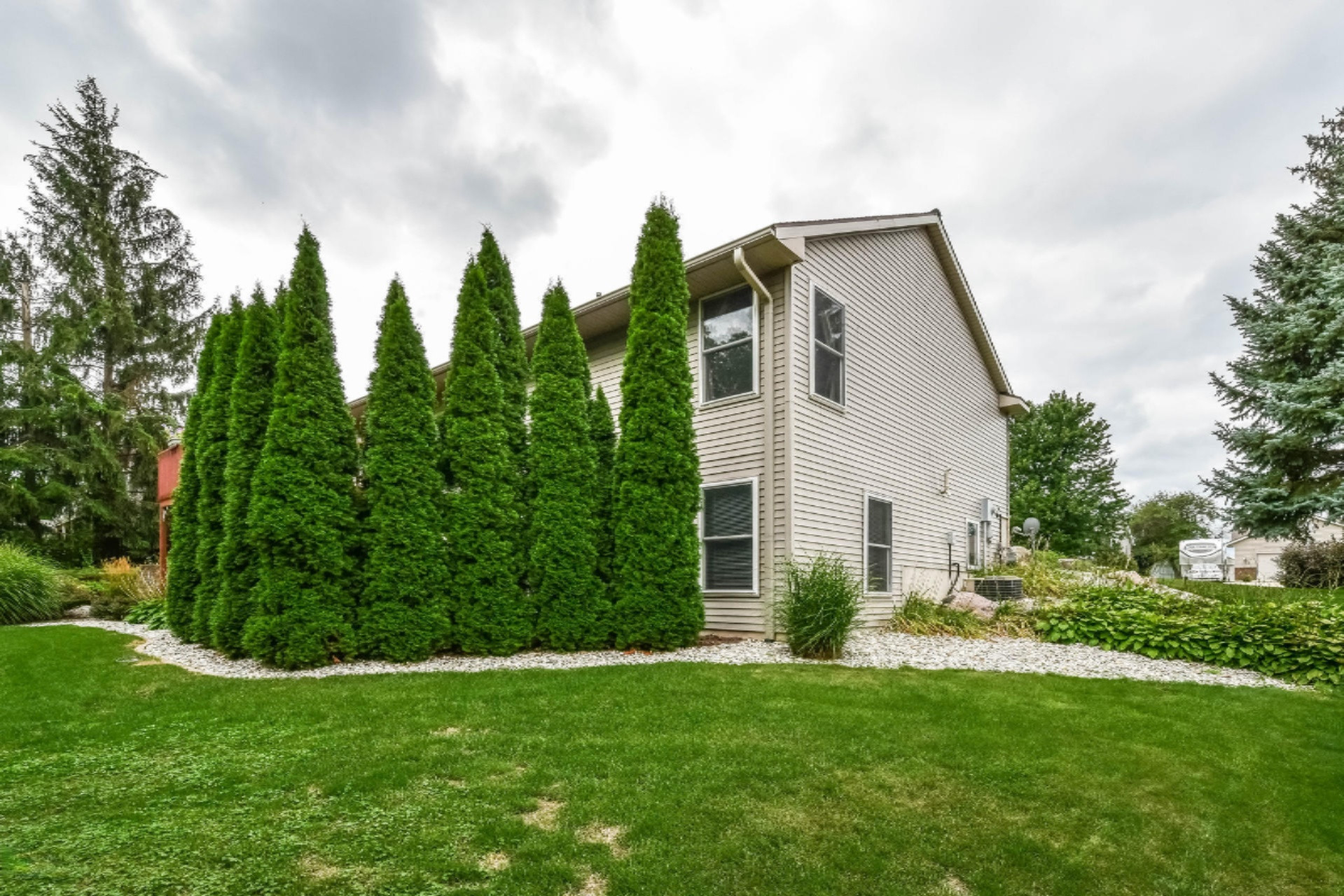8574 Ridgebluff Drive Southwest Byron Center, MI 49315 - Photo 41 of 52 041-Rear_View-4667149-medium