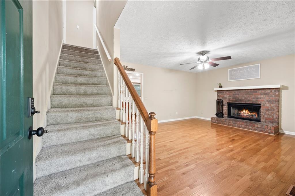 2009 Ben Higgins Road Dahlonega, GA 30533 - Photo 3 of 25 a view of an empty room with stairs