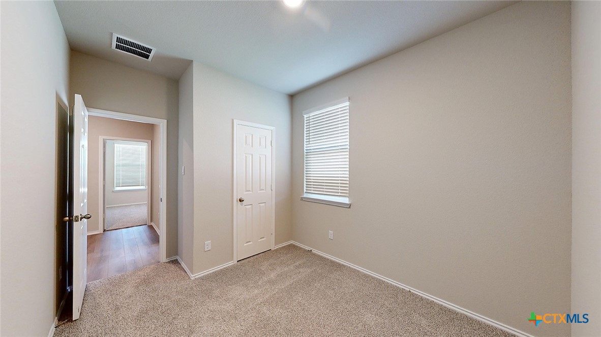 1110 Stone Vly Road Temple, TX 76502 - Photo 3 of 21 an empty room with windows and closet