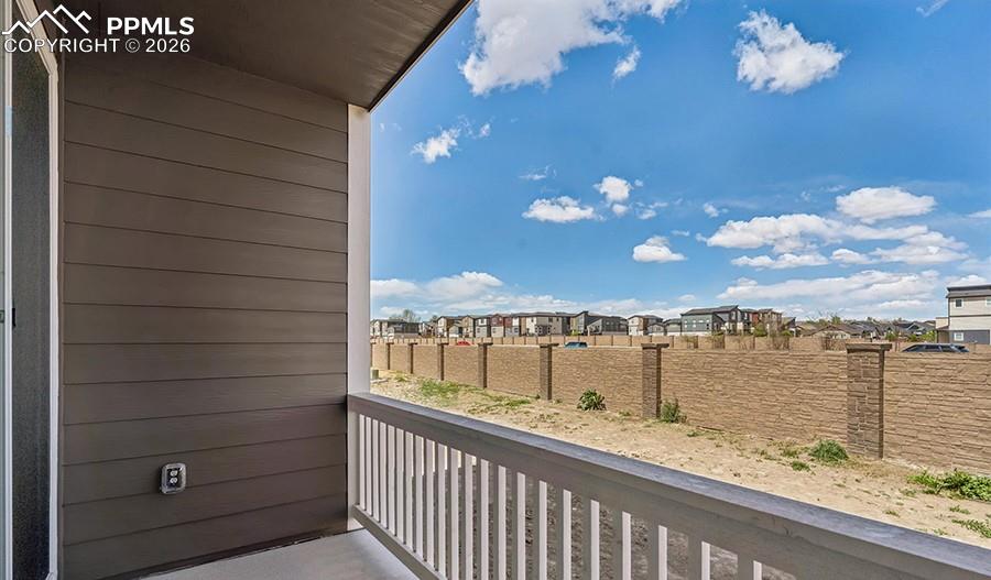 2485 Serviceberry Grove Colorado Springs, CO 80915 - Photo 19 of 22 a view of a balcony with an ocean view