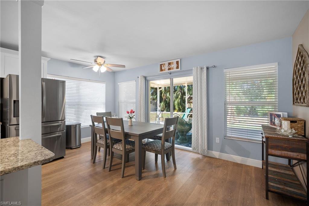 19034 Flamingo Road Fort Myers, FL 33967 - Photo 6 of 31 a view of a dining room with furniture window and outside view