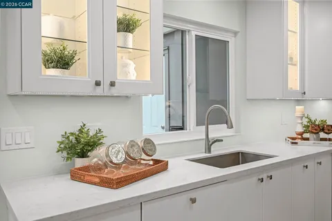 a bathroom with a sink and a window