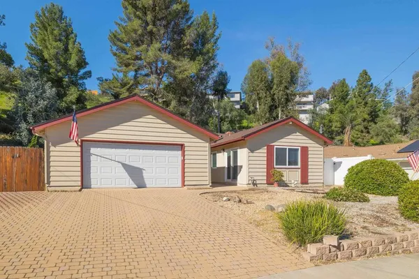 a house view with a outdoor space