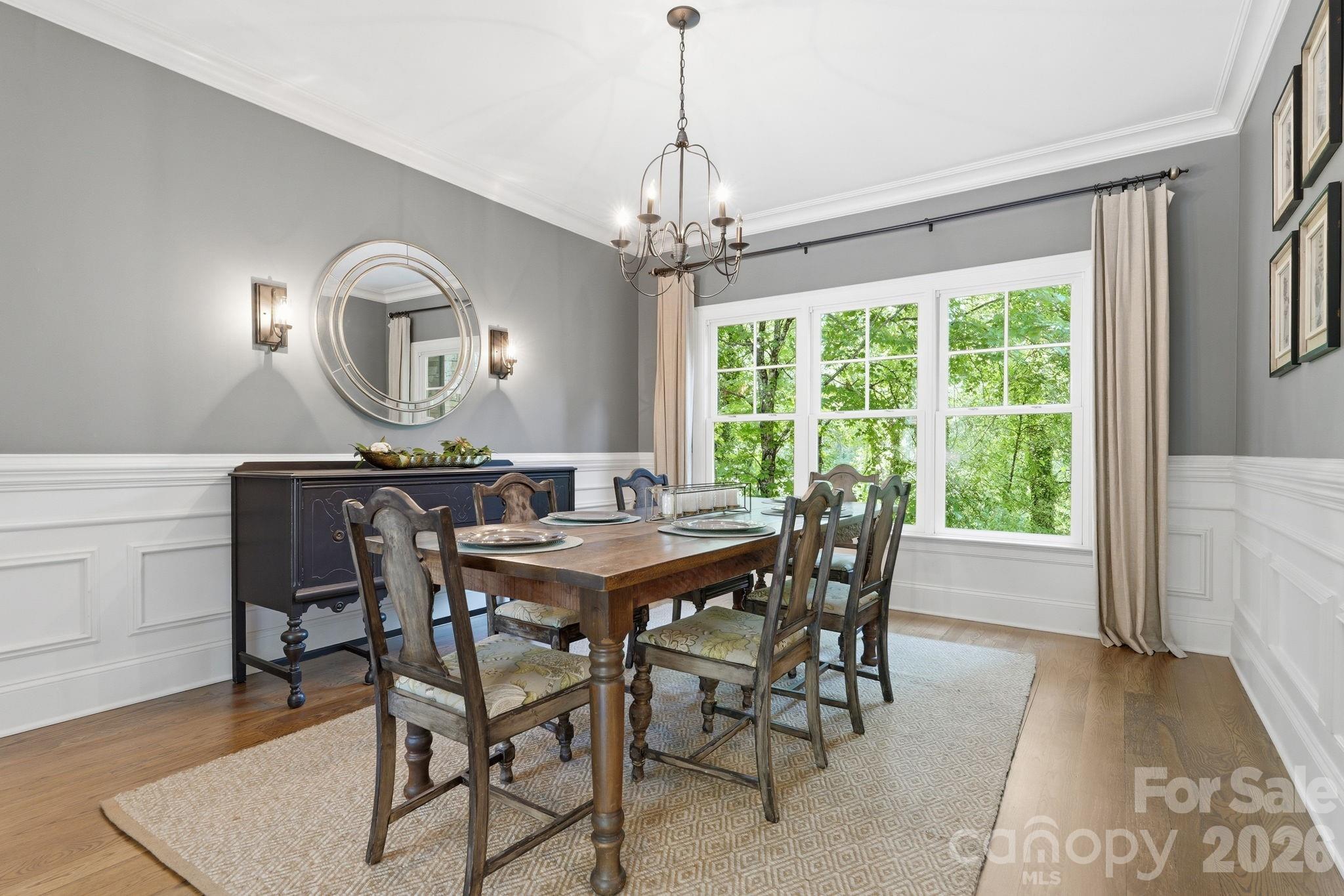 235 Grey Road Davidson, NC 28036 - Photo 4 of 42 a view of a dining room with furniture window and wooden floor