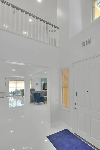 a view of kitchen and windows