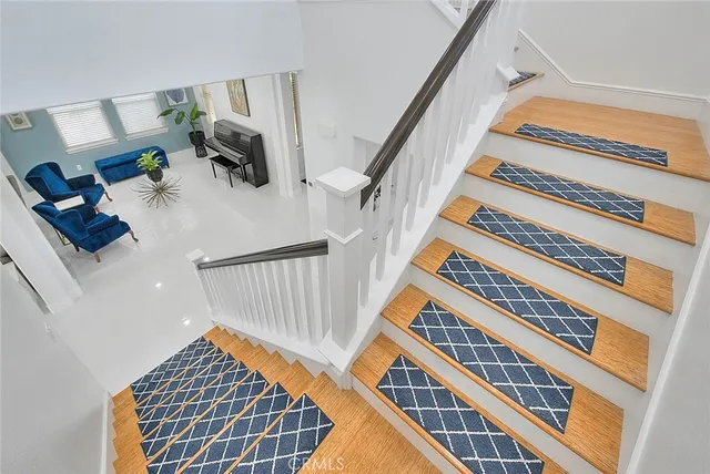 a view of entryway with workspace and stairs