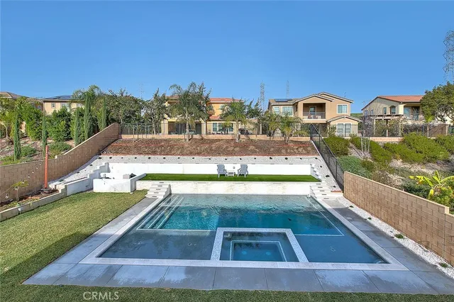 a view of swimming pool from a balcony