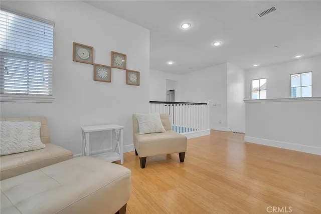 a bedroom with a bed and a chair