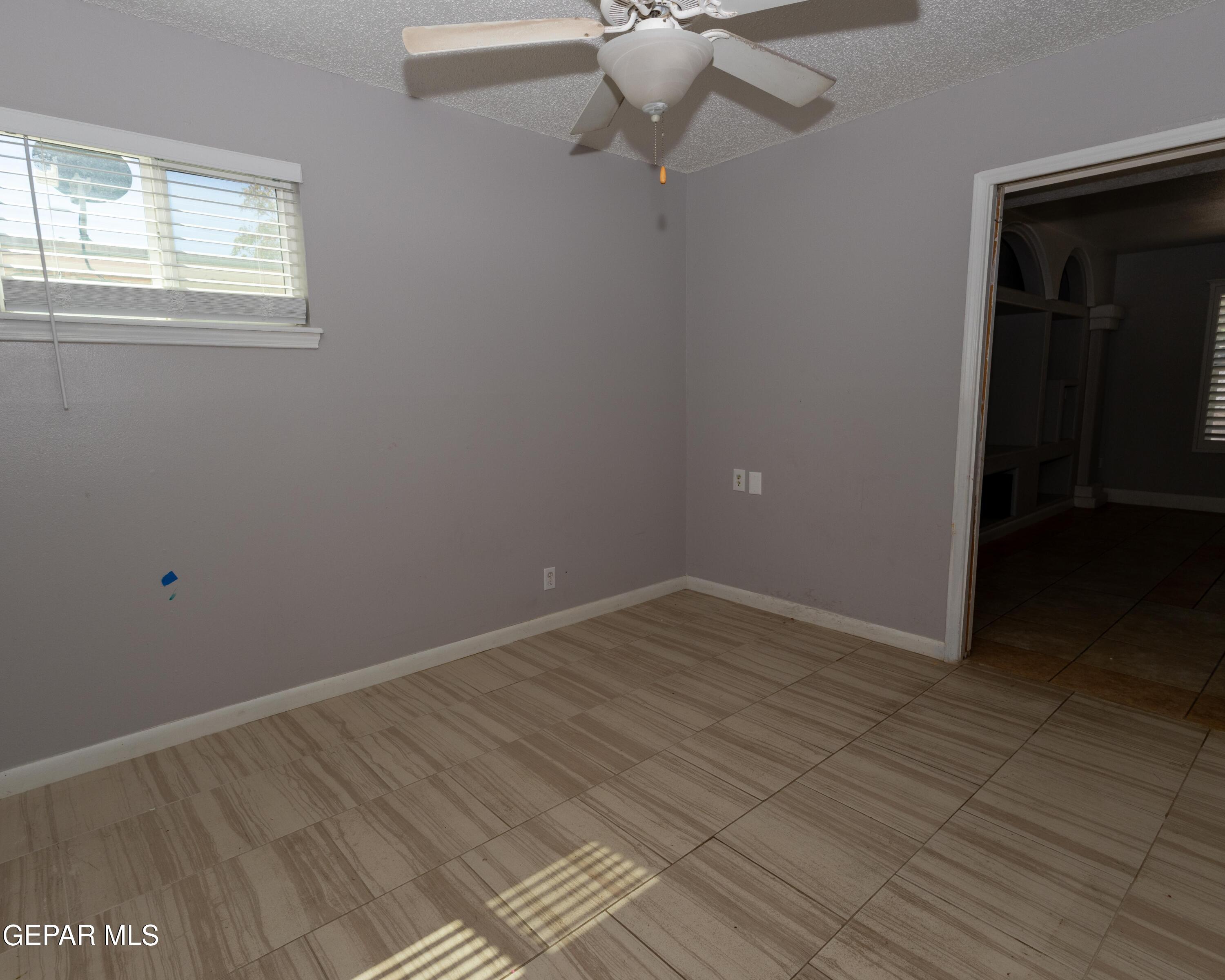 7860 Porche Street El Paso, TX 79915 - Photo 9 of 10 en empty room with window