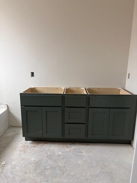 4149 Beale Street Heartland, TX 75114 - Photo 23 of 27 a room with a cabinets and a bed