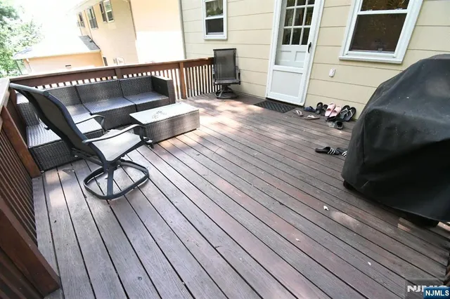 a view of balcony with wooden floor