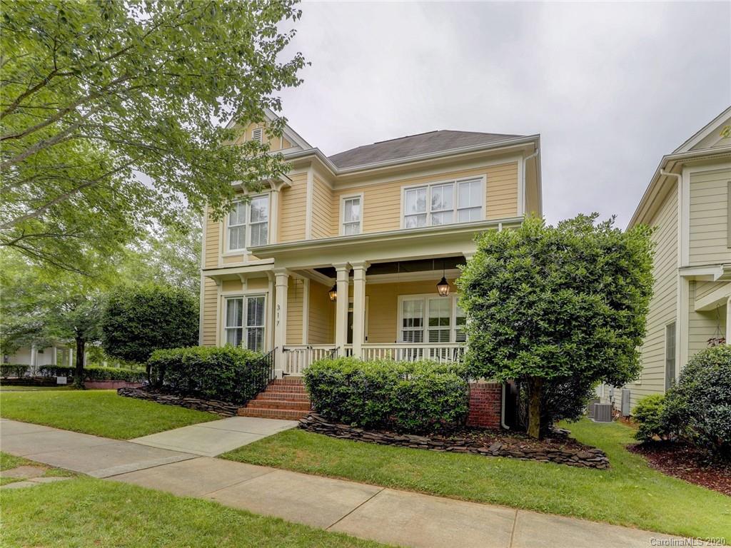 317 Third Baxter Street Fort Mill, SC 29708 - Photo 2 of 48 a front view of a house with a yard