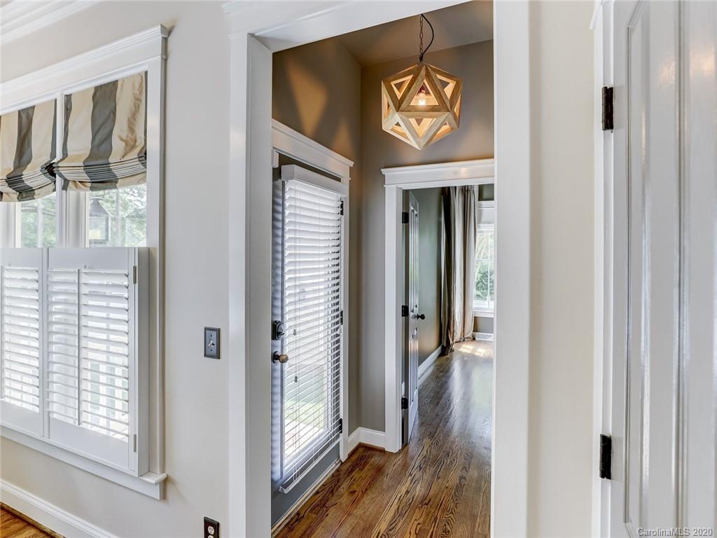 317 Third Baxter Street Fort Mill, SC 29708 - Photo 23 of 48 a view of a hallway with wooden floor and windows