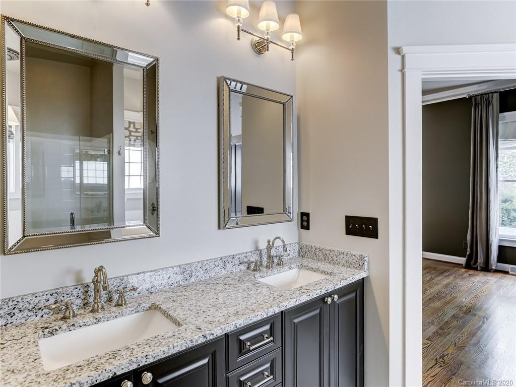317 Third Baxter Street Fort Mill, SC 29708 - Photo 28 of 48 a bathroom with a granite countertop sink and a mirror