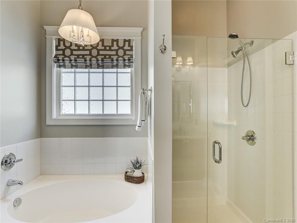 317 Third Baxter Street Fort Mill, SC 29708 - Photo 29 of 48 a bathroom with a bathtub and shower