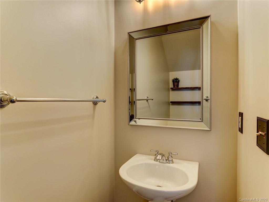 317 Third Baxter Street Fort Mill, SC 29708 - Photo 32 of 48 a bathroom with a sink and mirror