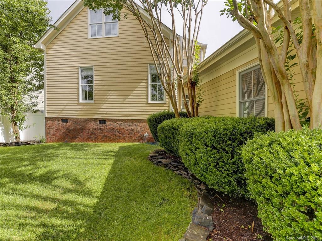 317 Third Baxter Street Fort Mill, SC 29708 - Photo 48 of 48 a front view of a house with garden