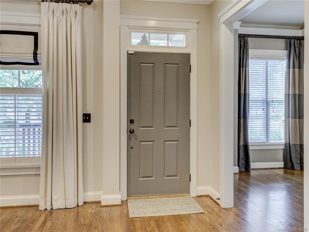 317 Third Baxter Street Fort Mill, SC 29708 - Photo 7 of 48 a view of a hallway with wooden floor and closet area