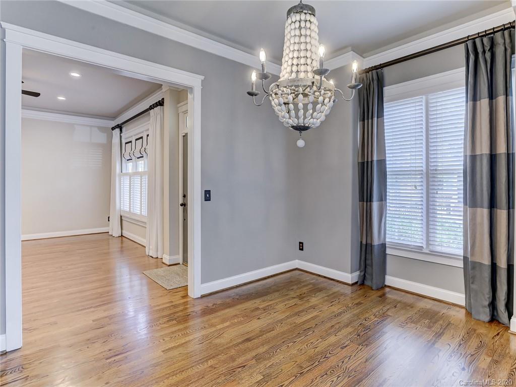 317 Third Baxter Street Fort Mill, SC 29708 - Photo 10 of 48 an empty room with wooden floor and windows