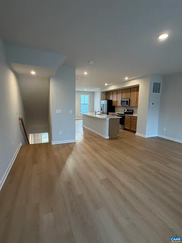 a view of a kitchen with a sink