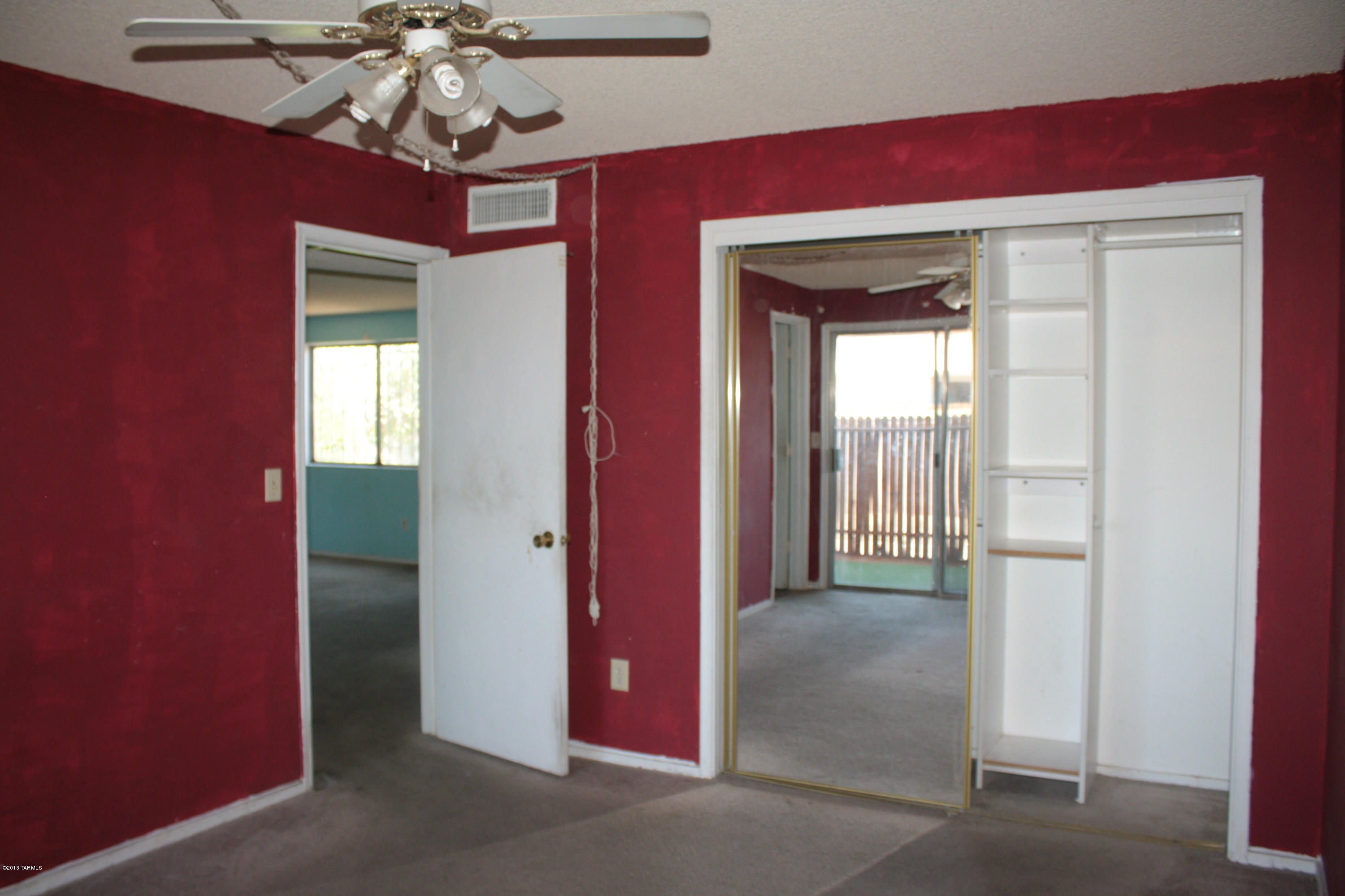 47 East Pastime Road Tucson, AZ 85705 - Photo 6 of 16 a view of a livingroom with a chandelier fan