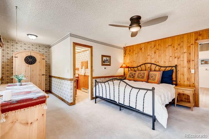 501 Peakview Road Boulder, CO 80302 - Photo 12 of 40 a bedroom with a bed and a window