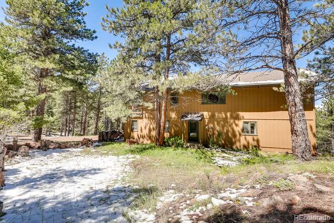 501 Peakview Road Boulder, CO 80302 - Photo 2 of 40 a view of a yard with large trees