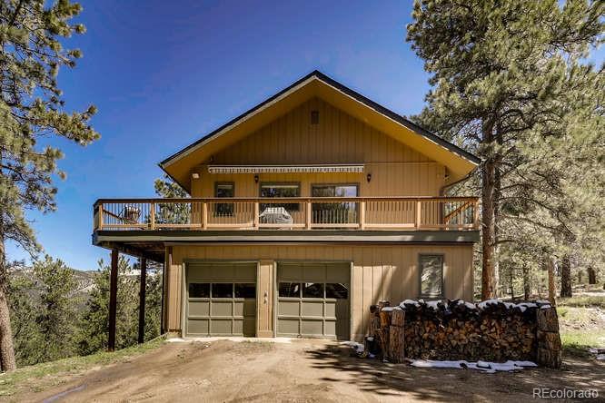 501 Peakview Road Boulder, CO 80302 - Photo 28 of 40 a front view of a house with garden