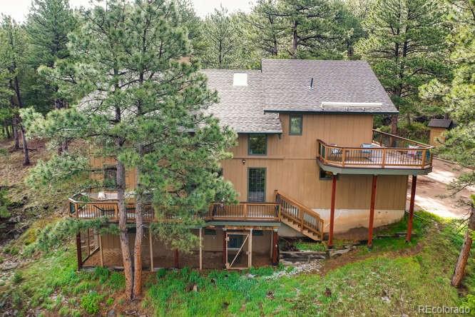 501 Peakview Road Boulder, CO 80302 - Photo 32 of 40 a aerial view of a house with a yard and sitting area