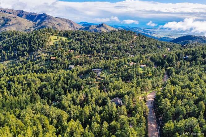 501 Peakview Road Boulder, CO 80302 - Photo 37 of 40 a view of a city with lush green forest