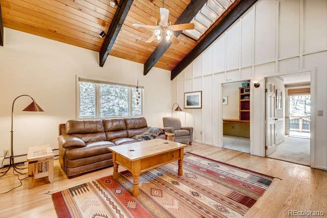 501 Peakview Road Boulder, CO 80302 - Photo 9 of 40 a living room with furniture and wooden floor