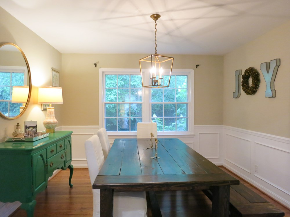 5215 Knollwood Road Raleigh, NC 27609 - Photo 7 of 30 Formal Dining Rm w/panel wainscot, chair rail molding & bronze iron light fixture opens to both Living Rm & Kitchen. Dining Room