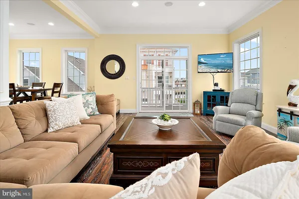 a dining room with furniture window wooden floor