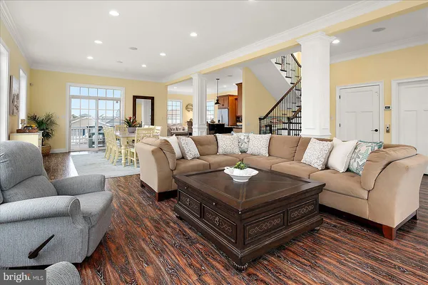 a bedroom with furniture and a mirror