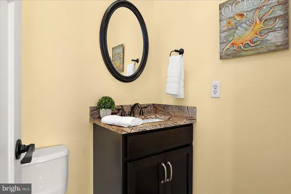 a utility room with sink dryer and washer
