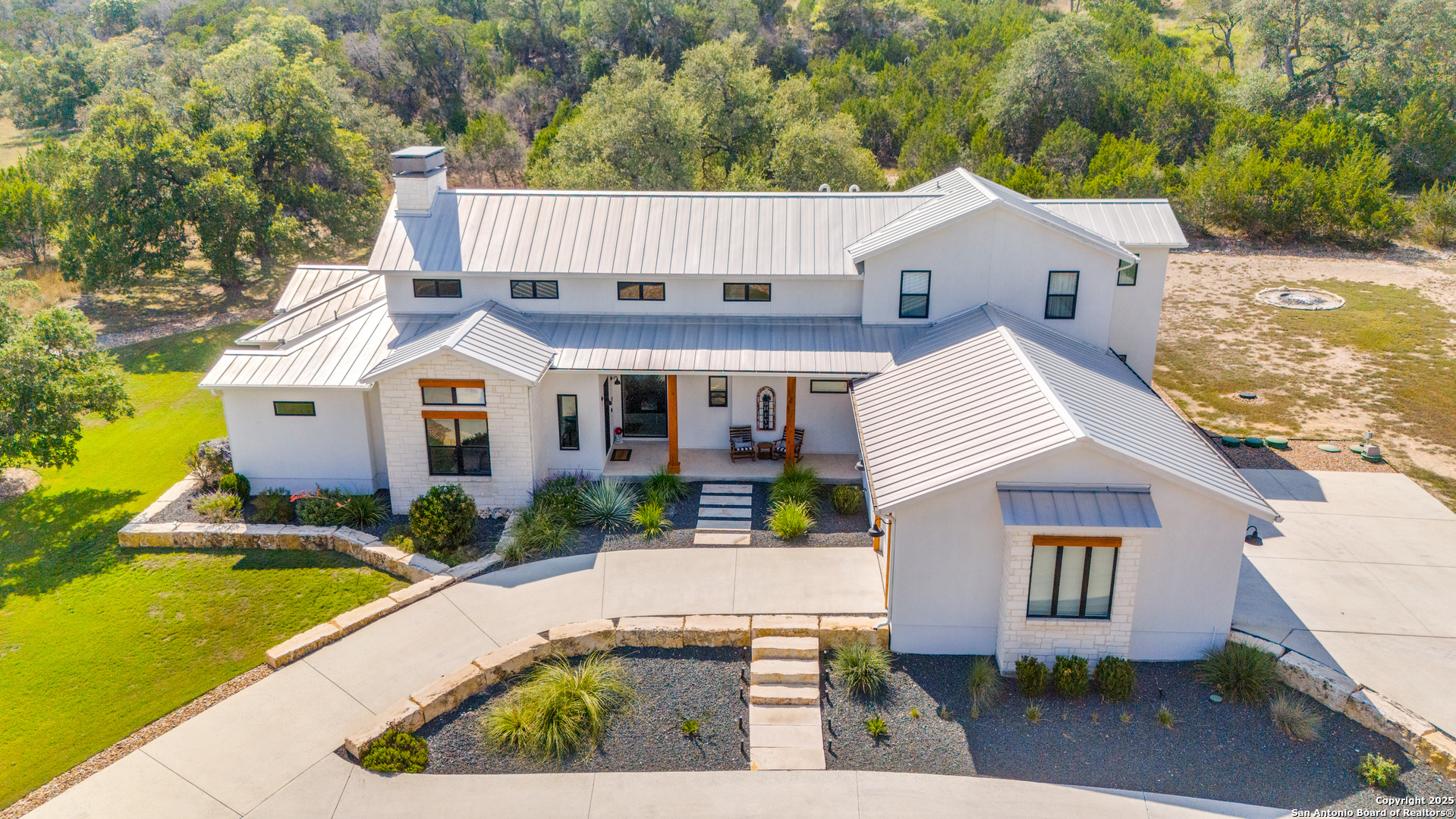 130 Saga Street Spring Branch, TX 78070 - Photo 1 of 49 a view of house with garden space and swimming pool