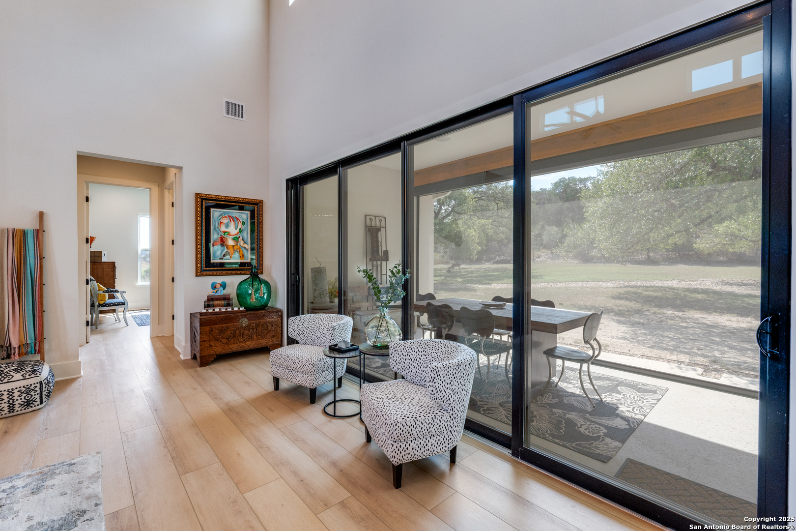 130 Saga Street Spring Branch, TX 78070 - Photo 13 of 49 a living room with furniture and a floor to ceiling window