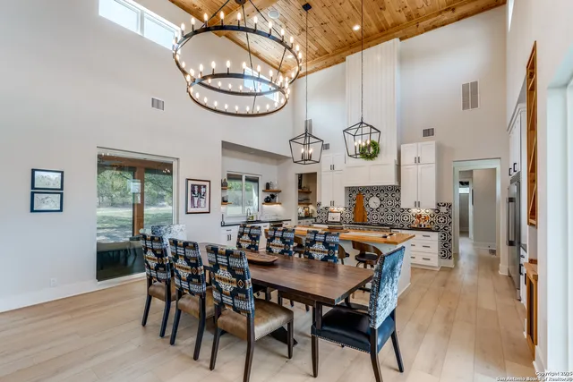 a kitchen with stainless steel appliances granite countertop a stove and a sink