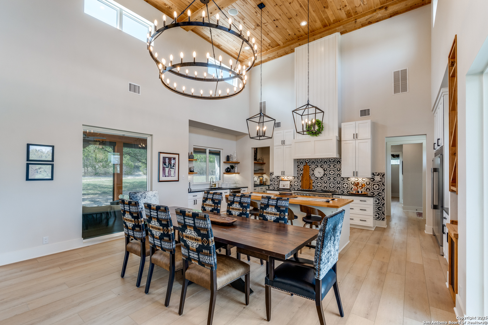 130 Saga Street Spring Branch, TX 78070 - Photo 16 of 49 a view of a dining room with furniture window and wooden floor