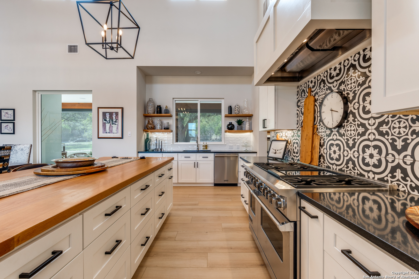 130 Saga Street Spring Branch, TX 78070 - Photo 17 of 49 a kitchen with stainless steel appliances granite countertop a stove and a sink