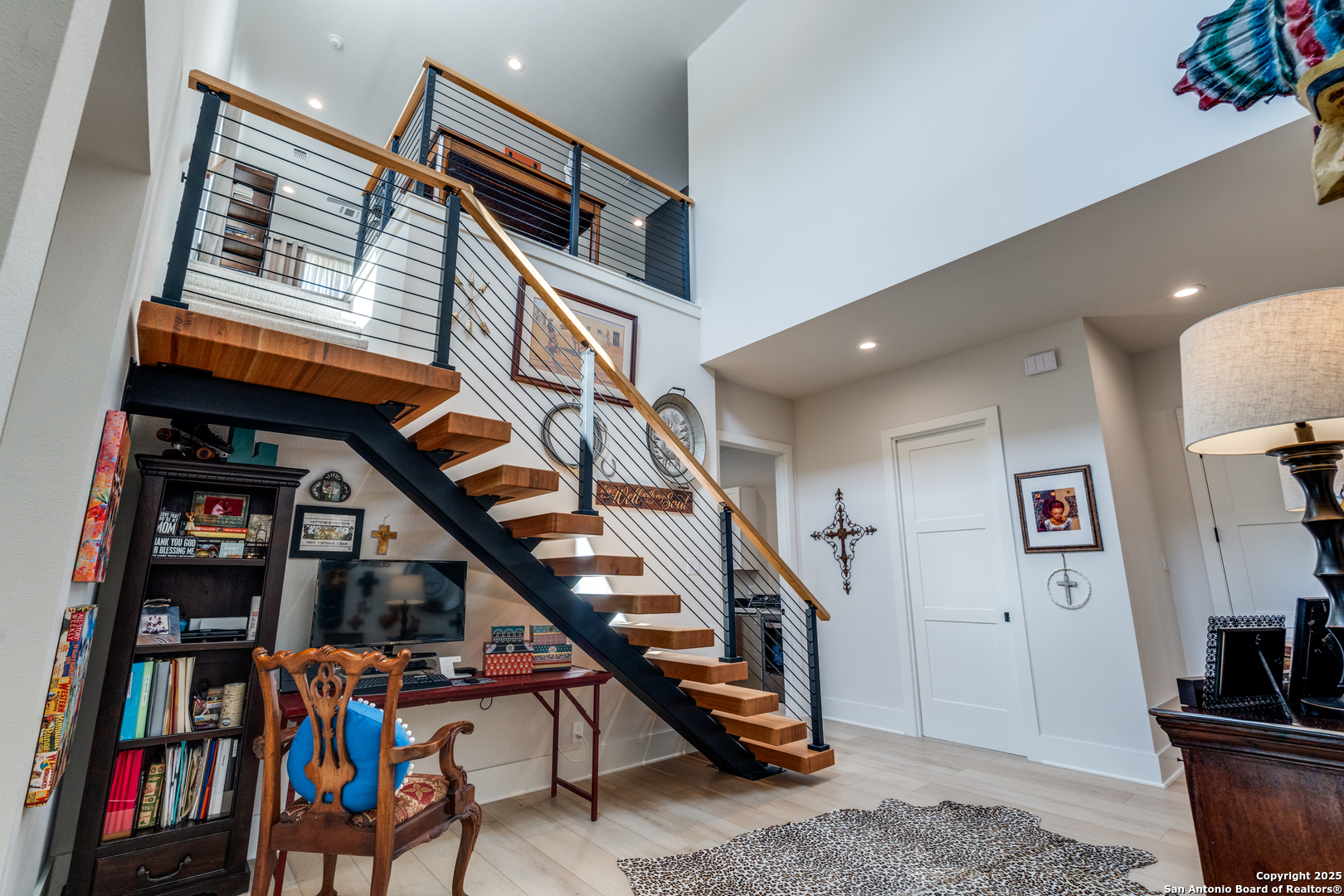 130 Saga Street Spring Branch, TX 78070 - Photo 21 of 49 a living room with lots of furniture and stairs