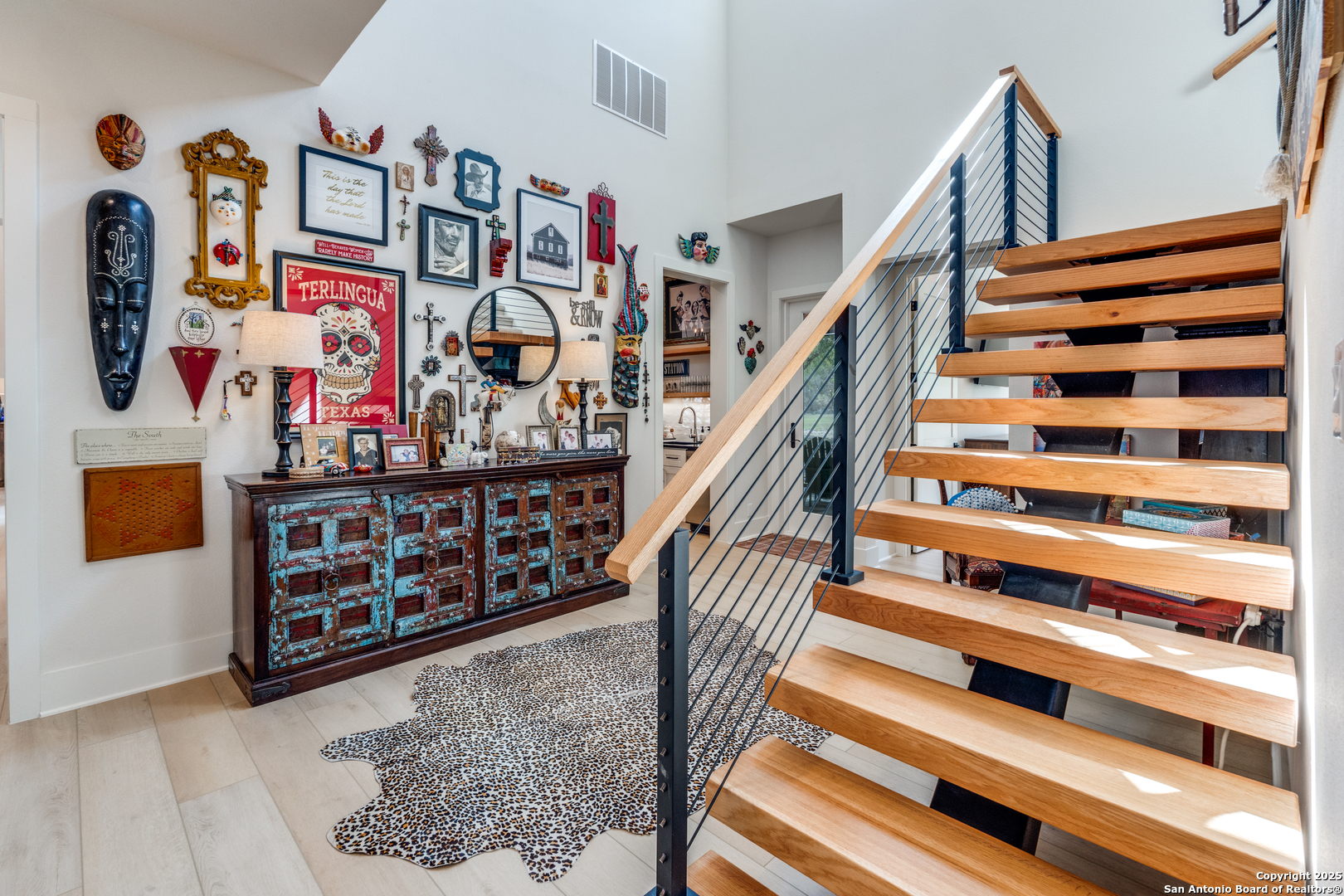 130 Saga Street Spring Branch, TX 78070 - Photo 23 of 49 a view of staircase with lots of frames on wall