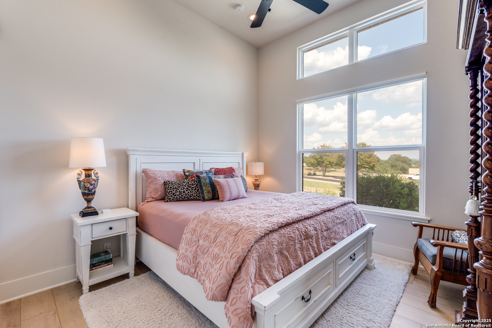 130 Saga Street Spring Branch, TX 78070 - Photo 35 of 49 a bedroom with a large bed and a window