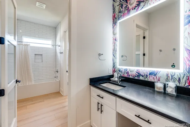 a kitchen with a stove and a microwave