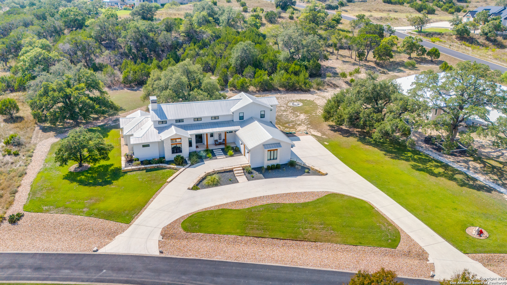 130 Saga Street Spring Branch, TX 78070 - Photo 4 of 49 a view of house with yard