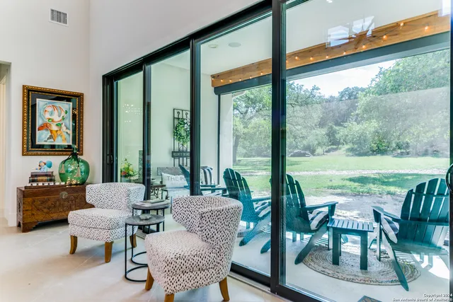 a view of swimming pool from a balcony