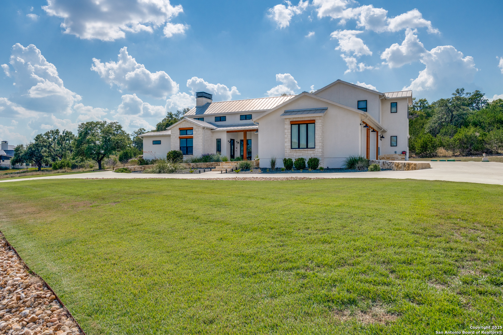 130 Saga Street Spring Branch, TX 78070 - Photo 6 of 49 a front view of house with yard and trees