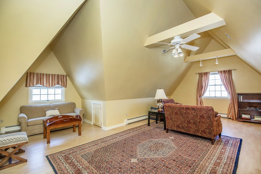 35 Winthrop Street Everett, MA 02149 - Photo 19 of 30 a living room with a couch and a window